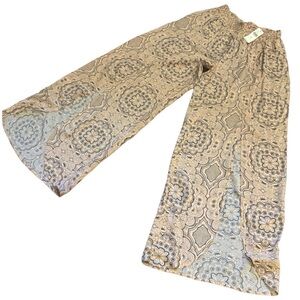 Anthropologie peach and black split leg pants